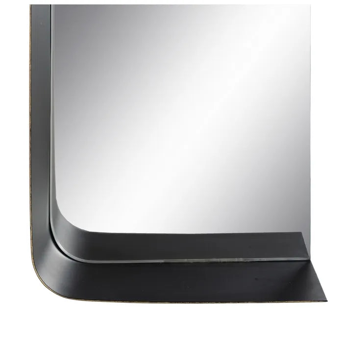 A close-up of a square wall mirror with a thick, black frame featuring a modern, curved bottom border and a subtle gold-toned edge accent | KULORI Malta & Gozo