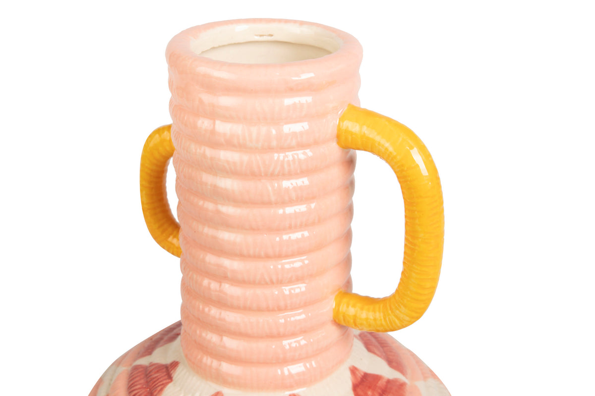 Close-up of a ceramic vase or bottle with a ribbed pale pink neck, two curved mustard-yellow handles, and a partially visible patterned base on a white background | KULORI Malta & Gozo