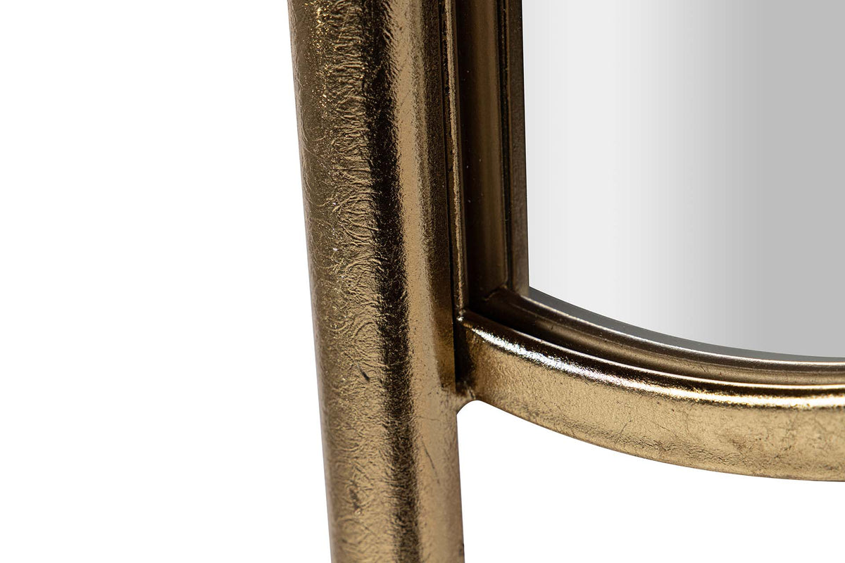 Close-up detail of a round wall mirror with a textured, distressed gold metal frame on a white background | KULORI Malta & Gozo