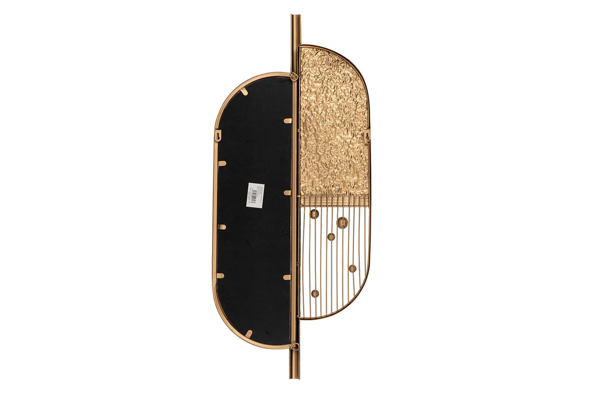 A modern wall mirror with an asymmetrical, abstract organic shape. The left half is black with gold mounting hardware, while the right half is textured gold on the top and features gold vertical lines on the bottom, all framed in gold and suspended from a gold pole | KULORI Malta & Gozo