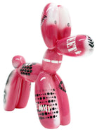 pink balloon dog sculpture with black and white graffiti text | KULORI