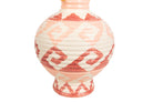 A ceramic vase with a rounded body and narrow neck, decorated with a textured, ribbed pattern in coral red and cream | KULORI Malta & Gozo