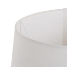 Close-up of a white fabric lampshade showing its textured weave and curved inner edge  | KULORI Malta & Gozo