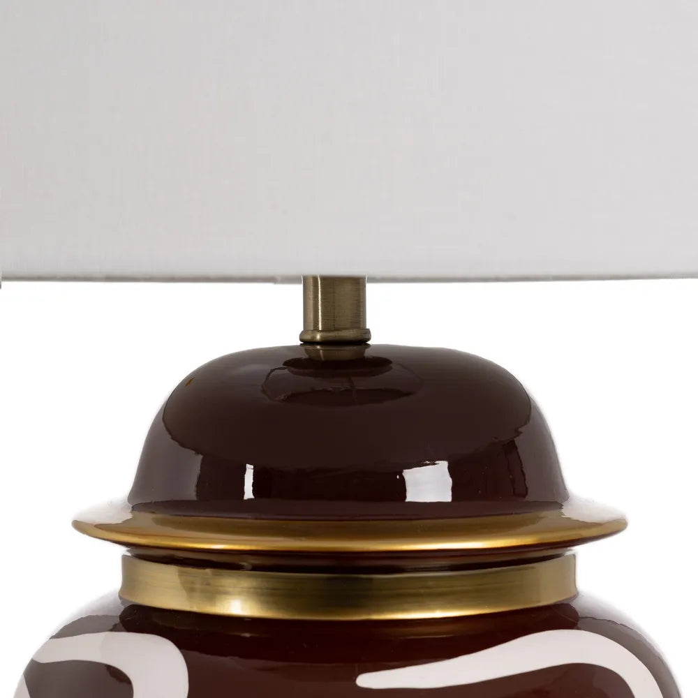 Close-up of a lamp with a brown base and gold accents | KULORI Malta & Gozo