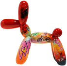 colourful balloon dog sculpture with graffiti-style writing | KULORI