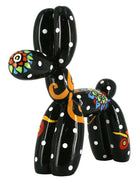 Black balloon dog with white polka dot sculpture and colourful patterns | KULORI
