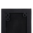 Close-up of the back of a black rectangular picture frame or wall-hanging frame, showing mounting holes and a textured black backing | KULORI Malta & Gozo