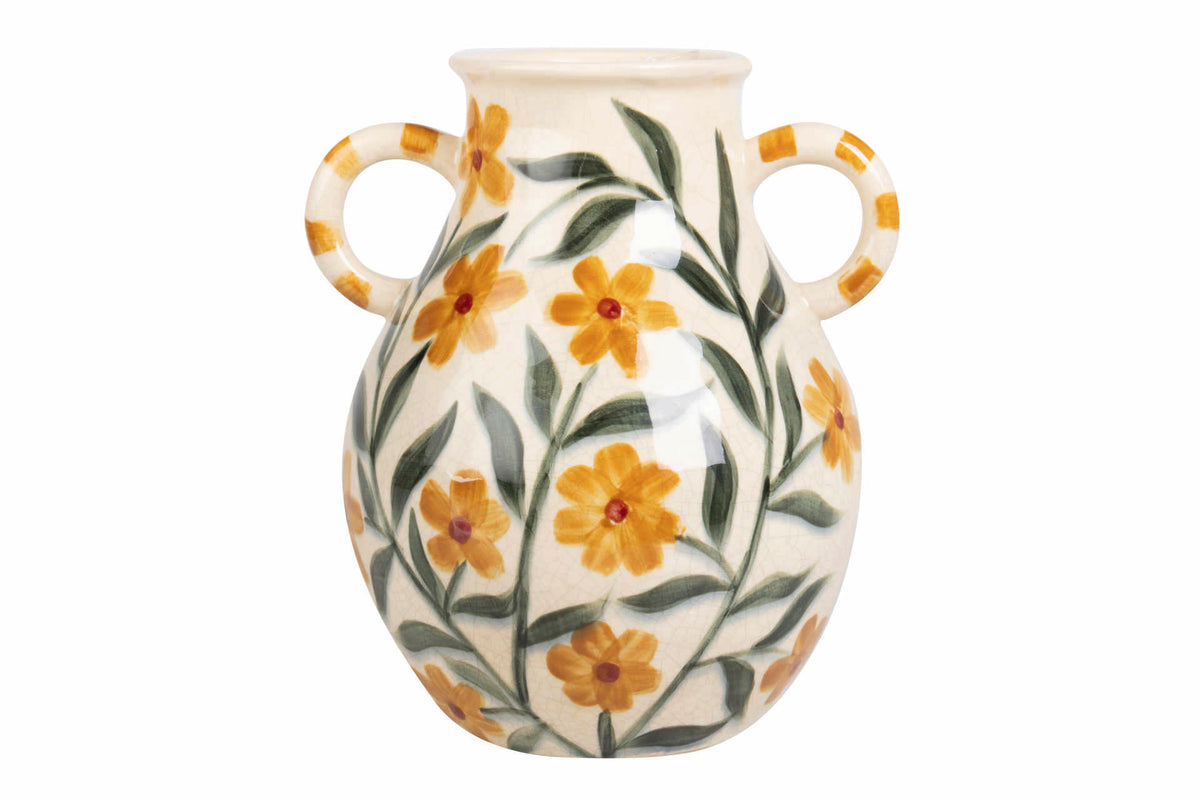 A cream-colored ceramic vase with two loop handles, decorated with a hand-painted pattern of yellow flowers and green leaves