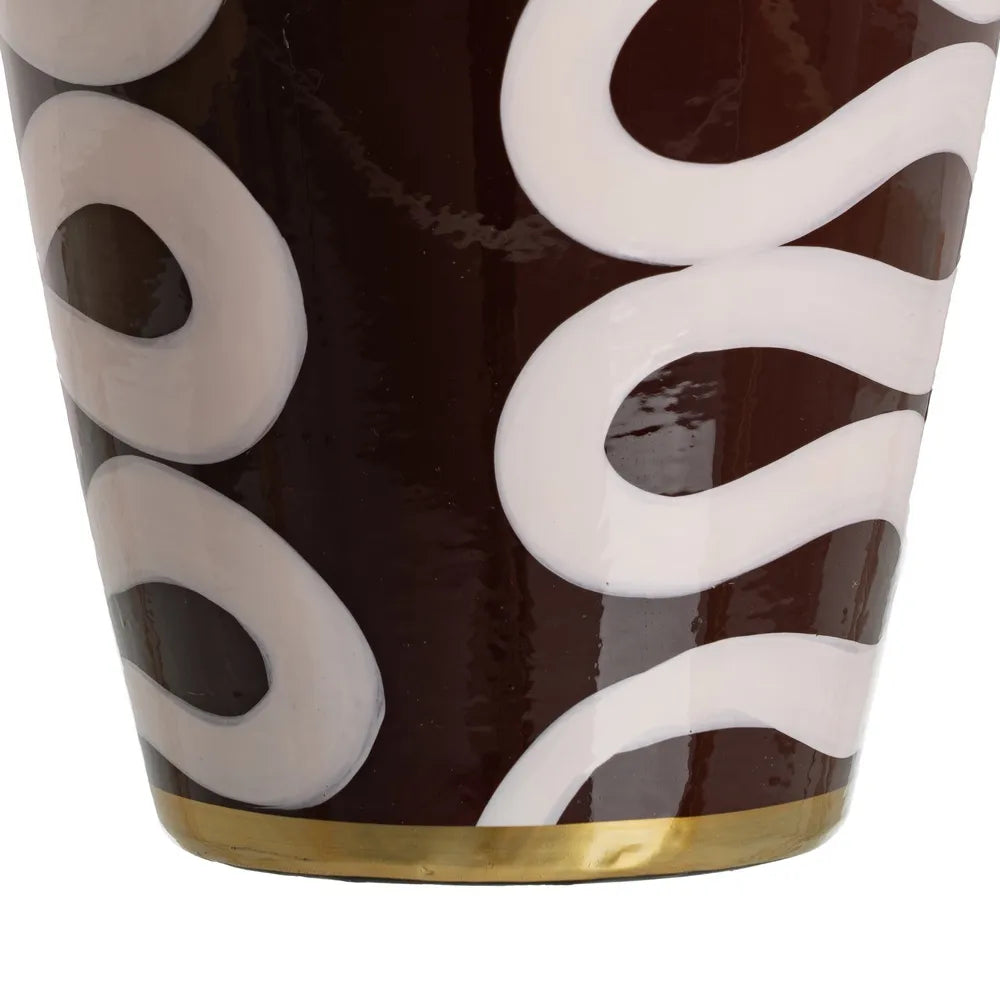 Close-up of a decorative vase with white spiral patterns | KULORI Malta & Gozo