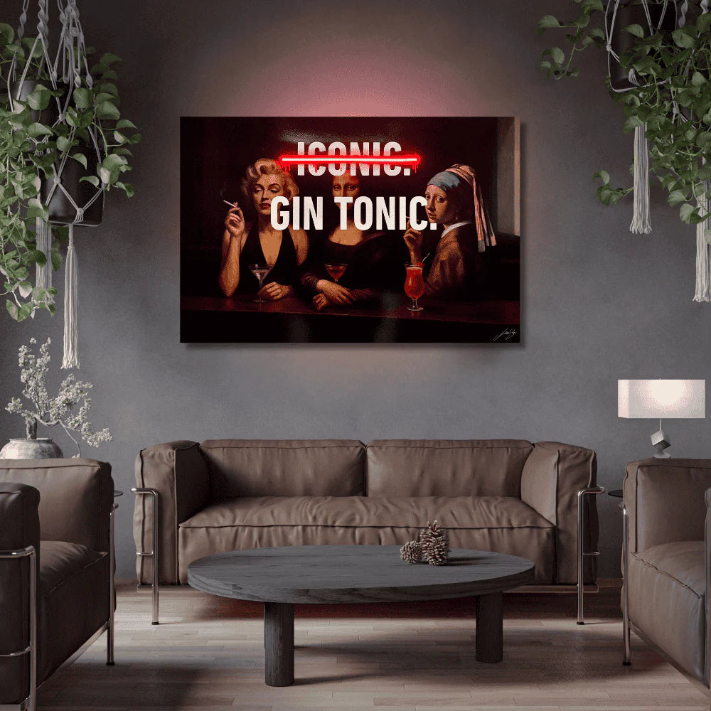 Living room with a modern sofa, coffee table, and wall art featuring a famous painting with text 'Iconic Gin Tonic'.