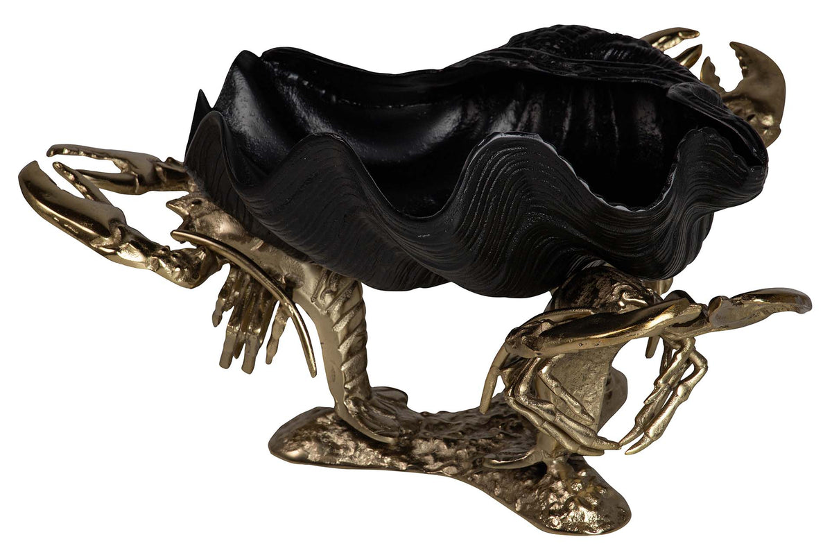 A decorative lobster figurine with a glossy black shell and metallic gold claws and base | KULORI Malta & Gozo