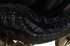Close-up detail of a glossy black aluminium bowl for champagne cooler. Object with ribbed ridges and a smooth curved surface | KULORI Malta & Gozo