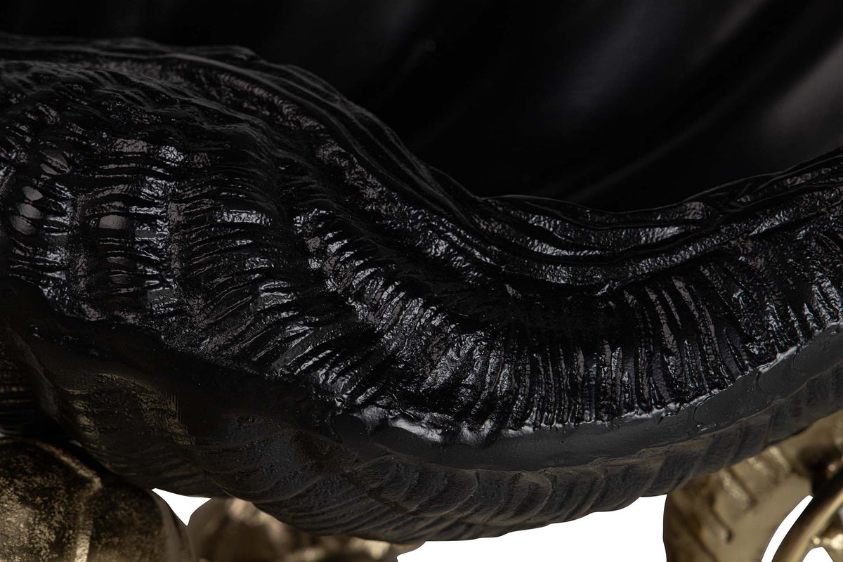 Close-up detail of a glossy black aluminium bowl for champagne cooler. Object with ribbed ridges and a smooth curved surface | KULORI Malta & Gozo
