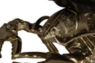 Close-up detail of a metallic lobster sculpture of champagne cooler with a textured, antique gold finish | KULORI Malta & Gozo