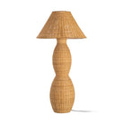 A natural woven rattan table lamp with a distinctive hourglass-shaped base and a matching tapered lampshade | KULORI Malta & Gozo